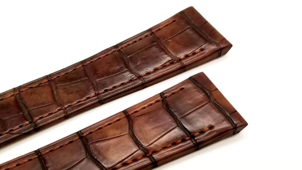 Genuine brown crocodile Selvaggio, featuring large scales